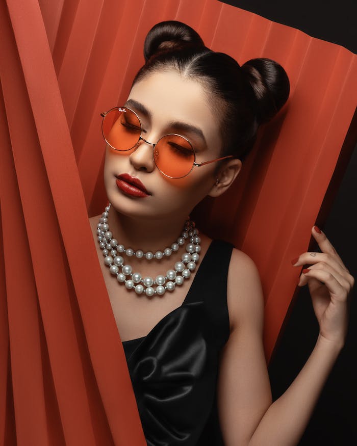 pexels-photo-3387577 Woman in Sunglasses With Beaded Necklace